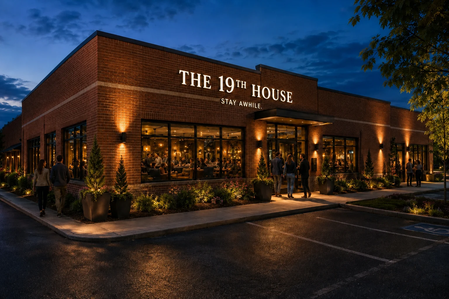 Concept rendering of the evening exterior of The 19th House, a red-brick gathering place with illuminated signage and glass storefront entry, guests arriving at dusk