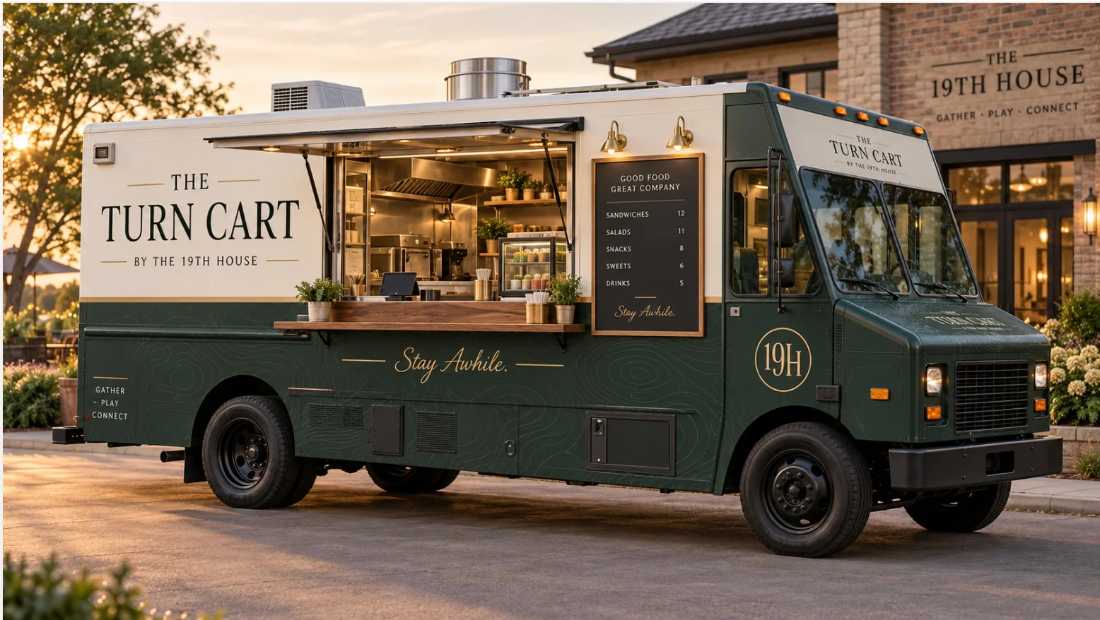 The Turn Cart, a forest-green food truck branded for The 19th House, serving sandwiches, salads, snacks, sweets, and drinks